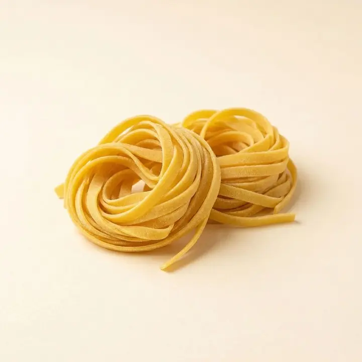 Nests of golden Jood tagliolini egg pasta